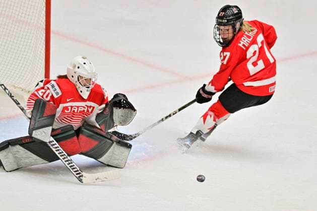 L-R goalkeeper Miyuu Masuhara (JPN) and Emma Maltais (CAN) in action during the IIHF Women s World Championship, WM, Weltmeisterschaft quarterfinal match Canada vs Japan, in Ceske Budejovice, Czech Republic, on April 17, 2025. (CTKxPhoto VaclavxPancer) CTKPhotoP2025041708841  CTKPhotoP2025041708841