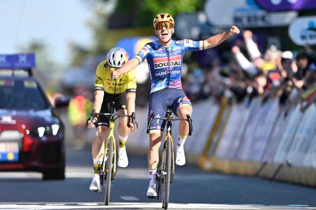 Brabantse Pijl 2025 cycling race OVERIJSE, BELGIUM - APRIL 18 : Evenepoel Remco (BEL) of Soudal - Quick Step wins and Van Aert Wout (BEL) of Team Visma - Lease a Bike during the Men Elite UCI 1.Pro 65th Flanders Classics Brabantse Pijl cycling race with start in Beersel and finish in Overijse (175,4 km) on April 18, 2025 in Overijse, Belgium, 18 04 2025 ( Motordriver Kenny Verfaillie & Overijse Belgium  Copyright: xJanxDexMeuleneirx