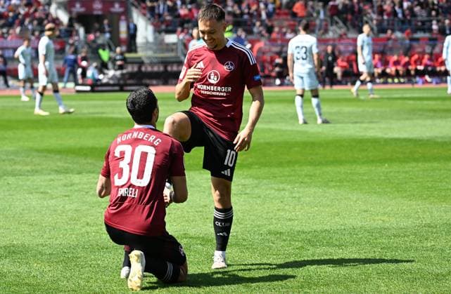 Sport Bilder des Tages 19.04.2024 - Fussball - Saison 2024 2025 - 2. Fussball - Bundesliga - 30. Spieltag: 1. FC Nürnberg FCN ( Club ) - SC Paderborn 07 SCP - Sportfoto Zink - xwoxzix - DFL regulations prohibit any use of photographs as image sequences and or quasi-video - only for editorial use - Torjubel Jubel Freude nach Treffer Tor Torschuß zum 1:0 durch Mahir Emreli (30, 1. FC Nürnberg FCN ) - Mahir Emreli (30, 1. FC Nürnberg FCN ) Julian Justvan (10, 1. FC Nürnberg FCN )