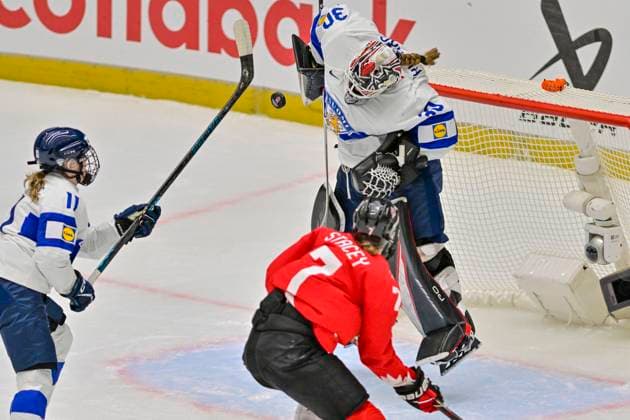 Goalkeeper Emilia Kyrkko of Finland, right, and Laura Stacey of Canada, center, in action during the Ice hockey, Eishockey IIHF WomenÂ s World Championship, WM, Weltmeisterschaft semifinal match Canada vs Finland, Ceske Budejovice, Czech Republic, April 19, 2025. (CTKxPhoto VaclavxPancer) CTKPhotoP2025041905242  CTKPhotoP2025041905242