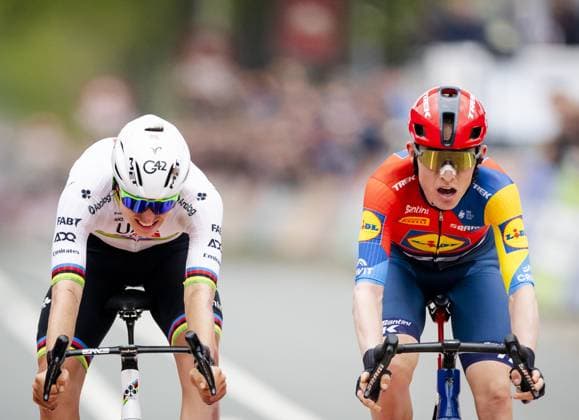 VALKENBURG - Tadej Pogacar (Slovenia) and Mattias Skjelmose (Denmark) cross the finish line of the 2025 Amstel Gold Race in Valkenburg. ANP MARCEL VAN HOORN Amstel Gold Race 2025 xVIxANPxSportx xxANPxIVx 524902486 originalFilename: 524902486.jpg