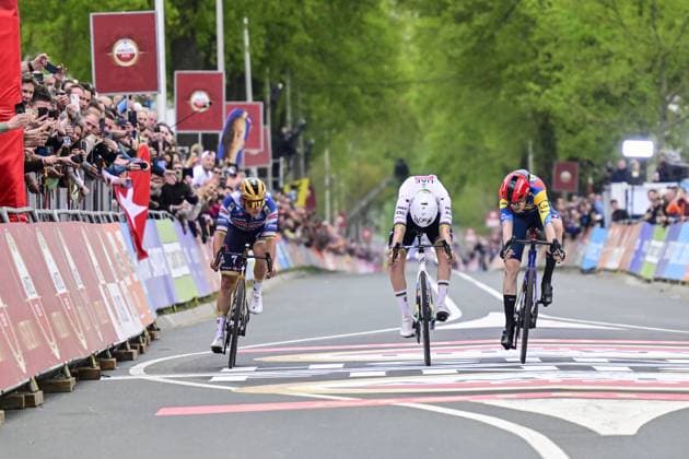 Belgian Remco Evenepoel of Soudal Quick-Step, Slovenian Tadej Pogacar of UAE Team Emirates and Danish Mattias Skjelmose Jensen of Lidl-Trek sprint to the finish of the men elite Amstel Gold Race one day cycling race, 255,9 km from Maastricht to Valkenburg, The Netherlands, Sunday 20 April 2025. DIRKxWAEM  x121320760x