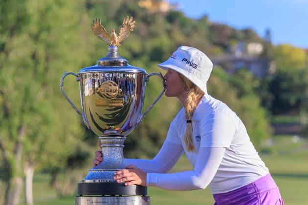 April 20, 2025, Tarzana, California, USA: Ingrid Lindblad kisses the trophy after winning the JM Eagle LA Championship presented by Plastpro on Sunday April 20, 2025 at El Caballero Country Club in Tarzana, California. ARIANA RUIZ PI Tarzana USA - ZUMAp124 20250420_zaa_p124_062 Copyright: xArianaxRuizx
