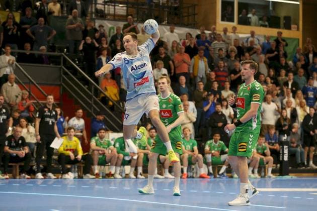21.04.2025, Herren, Handball, Saison 2024 2025, 2. Handball-Bundesliga, 28. Spieltag: TV Grosswallstadt - TSV GWD Minden Florian Kranzmann ( 5, GWD Minden) und Adam Nyfjaell ( 25, GWD Minden) koennen Maxim Schalles ( 87, TV Grosswallstadt) hier nicht mehr beim Abschluss hindern, Schalles erzielt hier das 39:36 (Endstand) Elsenfeld Untermainhalle Bayern Deutschland