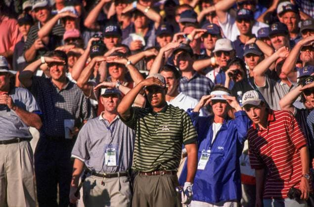 The 1999 Ryder Cup Matches TIGER WOODS LOOKING INTO SUN ON 1ST AFTERNOON FOURBALLS 33rd RYDER CUP 25th SEPTEMBER 1999 THE COUNTRY CLUB, BROOKLINE, BOSTON, MASSACHUSETTES USA During the 33rd Ryder Cup (1999), which took place at The Country Club in Brookline, Massachusetts, Tiger Woods had several memorable moments, including the first afternoon fourballs. A specific image you™re referring to Tiger Woods looking into the sun on the 1st hole during the afternoon fourballs captures a dramatic moment of the match. Woods was known for his intense focus, and this scene, likely with the setting sun casting shadows on the course, symbolizes the level of concentration and determination he brought to the tournament Copyright: xMarkxNewcombex