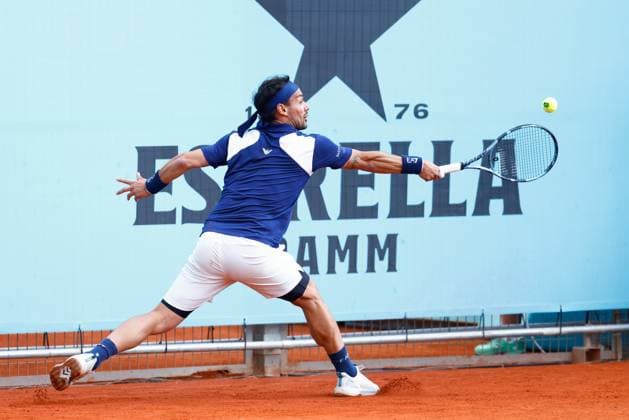 April 22, 2025, Madrid, Madrid, SPAIN: Fabio Fognini of Italy in action against Rinky Hijikata of Australia during the Mutua Madrid Open 2025, ATP, Tennis Herren Masters 1000 and WTA, Tennis Damen 1000, tennis tournament celebrated at Caja Magica on April 22, 2025 in Madrid, Spain. Madrid SPAIN - ZUMAa181 20250422_zaa_a181_183 Copyright: xDennisxAgyemanx