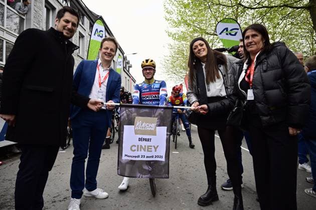 Walloon Minister President and minister of Finance, Budget, Research in the FWB Adrien Dolimont, Ciney mayor Frederic Deville, Belgian Remco Evenepoel of Soudal Quick-Step and Walloon Minister of Sports Infrastructure and Administrative Simplification Jacqueline Galant pictured at the start of the men s race of the La Fleche Wallonne , one day cycling race (Waalse Pijl - Walloon Arrow), 205,2 km from Ciney to Huy, Wednesday 23 April 2025. DIRKxWAEM  x121621846x