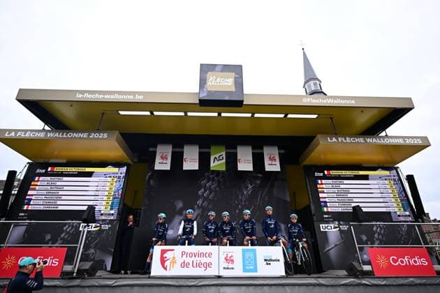 La Fleche Wallonne 2025 cycling race HUY, BELGIUM - APRIL 23 : Team Bahrain - Victorious on stage before the start of the race during the Men Elite UCI 1.Pro 89th A.S.O. La Fleche Wallonne cycling race with start in Ciney and finish in Huy (205,2 km) on April 23, 2025 in Huy, Belgium, 23 04 2025 ( Motordriver Guy De Vuyst & Huy Belgium  Copyright: xTomasxSiskx