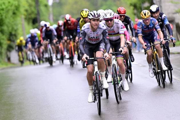 The pack of riders pictured, Slovenian Tadej Pogacar of UAE Team Emirates and Belgian Remco Evenepoel of Soudal Quick-Step pictured in action during the men s race of the La Fleche Wallonne , one day cycling race (Waalse Pijl - Walloon Arrow), 205,2 km from Ciney to Huy, Wednesday 23 April 2025. DIRKxWAEM  x121647699x