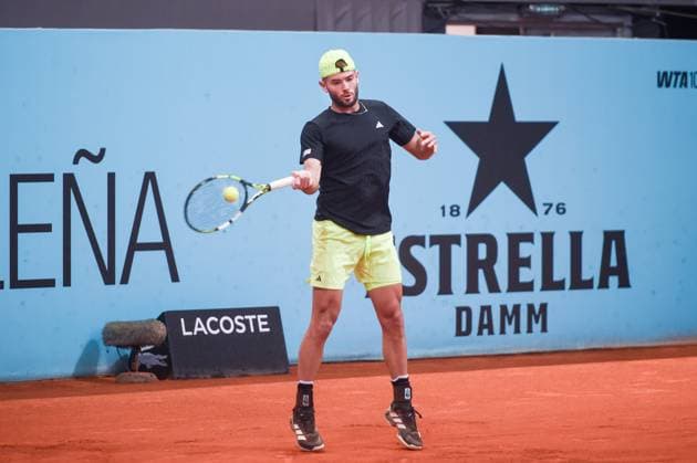 (250425) -- MADRID, April 25, 2025 -- Jacob Fearnley hits a return during the Round of 128 match between Bu Yunchaokete of China and Jacob Fearnley of Britain at the Mutua Madrid Open tennis tournament in Madrid, Spain, April 24, 2025. (Photo by Xinhua) (SP)SPAIN-MADRID-TENNIS-MADRID OPEN-MEN S SINGLES GustavoxValiente 