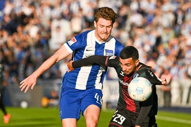 Fussball 2.Bundesliga, Hertha BSC Berlin - 1.FC Magdeburg 25.04.2025, xdanx, Fussball 2.Bundesliga, Hertha BSC Berlin - 1.FC Magdeburg v.l.Linus Gechter (Hertha BSC),Livan Burcu (1.FC Magdeburg) Zweikampf, Duell, Kampf, tackle (DFL DFB REGULATIONS PROHIBIT ANY USE OF PHOTOGRAPHS as IMAGE SEQUENCES and or QUASI-VIDEO) Daniel Lakomski Mix1Press Berlin Olympiastadion Berlin Deutschland (DEU)