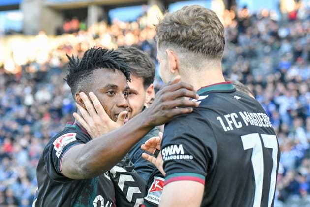 Fussball 2.Bundesliga, Hertha BSC Berlin - 1.FC Magdeburg 25.04.2025, xdanx, Fussball 2.Bundesliga, Hertha BSC Berlin - 1.FC Magdeburg v.l.Lubambo Musonda (1.FC Magdeburg), Alexander Nollenberger (1.FC Magdeburg) Jubel ueber das 0:1 (DFL DFB REGULATIONS PROHIBIT ANY USE OF PHOTOGRAPHS as IMAGE SEQUENCES and or QUASI-VIDEO) Daniel Lakomski Mix1Press Berlin Olympiastadion Berlin Deutschland (DEU)