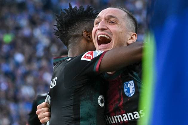 Fussball 2.Bundesliga, Hertha BSC Berlin - 1.FC Magdeburg 25.04.2025, xdanx, Fussball 2.Bundesliga, Hertha BSC Berlin - 1.FC Magdeburg v.l. Torschuetze Lubambo Musonda (1.FC Magdeburg), BarÄ±Åü Atik (1.FC Magdeburg) Jubel ueber das Tor (DFL DFB REGULATIONS PROHIBIT ANY USE OF PHOTOGRAPHS as IMAGE SEQUENCES and or QUASI-VIDEO) Daniel Lakomski Mix1Press Berlin Olympiastadion Berlin Deutschland (DEU)