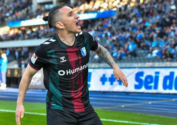 Fussball 2.Bundesliga, Hertha BSC Berlin - 1.FC Magdeburg 25.04.2025, xdanx, Fussball 2.Bundesliga, Hertha BSC Berlin - 1.FC Magdeburg v.l. BarÄ±Åü Atik (1.FC Magdeburg) Jubel ueber ein Tor (DFL DFB REGULATIONS PROHIBIT ANY USE OF PHOTOGRAPHS as IMAGE SEQUENCES and or QUASI-VIDEO) Daniel Lakomski Mix1Press Berlin Olympiastadion Berlin Deutschland (DEU)