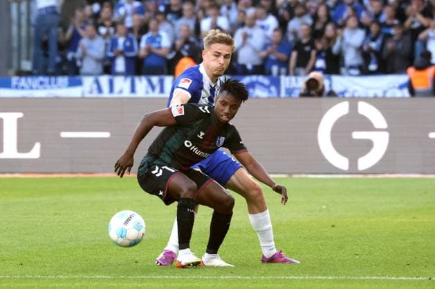 DEU, DFL, 2. FBL, Hertha BSC vs. 1.FC Magdeburg, 25.04.2025, Berliner Olympiastadion, Berlin, DEU, DFL, 2. FBL, Hertha BSC vs. 1.FC Magdeburg, im Bild Marten Winkler (Hertha BSC Berlin 22), Lubambo Musonda (1.FC Magdeburg 19) DFL - regulations prohibit any use of Photographs as image sequences and or quasi-video