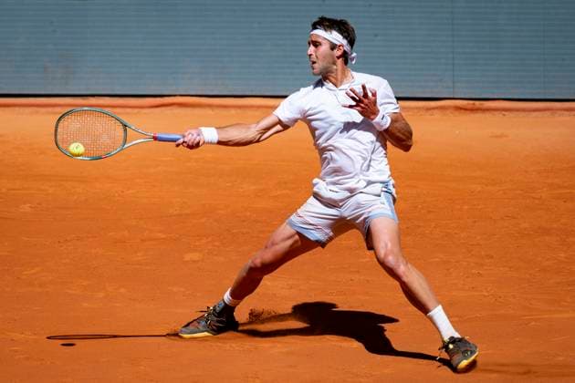 Mutua Madrid Open 2025 Tomas Etcheverry of Argentina plays a forehand against Lorenzo Musetti of Italy during Men s Round of 64 match of the Mutua Madrid Open 2025 tournament celebrated at La Caja Magica on April 26, 2025 in Madrid, Spain. Madrid La Caja Magica Madrid Spain Copyright: xAlbertoxGardinx AGardin_20250426_Mutua_Madrid_Open_0312