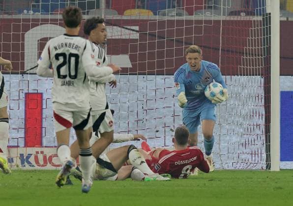 26.04.2024 - Fussball - Saison 2024 2025 - 2. Fussball - Bundesliga - 31. Spieltag: Fortuna Düsseldorf 95 F95 - 1. FC Nürnberg FCN ( Club ) - Sportfoto Zink DaMa - xdaxmax - DFL regulations prohibit any use of photographs as image sequences and or quasi-video - only for editorial use - Jan Reichert (1, 1. FC Nürnberg FCN ) jubelt freut sich Freude ballt Faust Fäuste nach Abwehraktion
