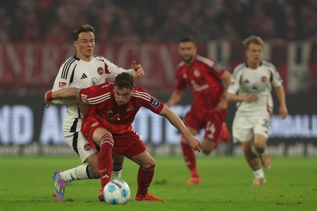Caspar Jander (1.FC Nürnberg) und Moritz Heyer (Fortuna Duesseldorf) im Zweikampf waehrend des Spiels der 2. Bundesliga zwischen Fortuna Düsseldorf und 1. FC Nürnberg im Merkur Spiel-Arena am 26. April 2025 in Düsseldorf, Deutschland. (Foto von Oliver Kaelke DeFodi Images) +++ Caspar Jander (1.FC Nürnberg) und Moritz Heyer (Fortuna Duesseldorf) battle for the ball during the 2. Bundesliga match between Fortuna Düsseldorf and 1. FC Nürnberg at Merkur Spiel-Arena on April 26, 2025 in Düsseldorf, Germany. (Photo by Oliver Kaelke DeFodi Images) DFB DFL REGULATIONS PROHIBIT ANY USE OF PHOTOGRAPHS AS IMAGE SEQUENCES AND OR QUASI-VIDEO. (Photo by Oliver Kaelke DeFodi Images)