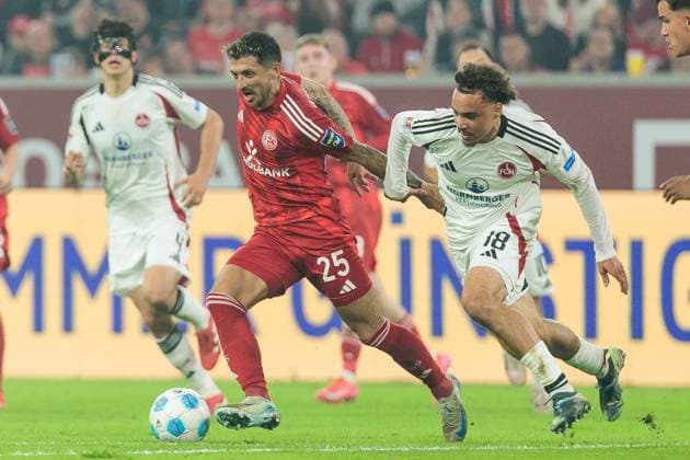 2. Fussball Bundesliga; Fortuna Düsseldorf 1895 - 1. FC Nürnberg; 26.04.2025 Zweikampf Matthias Zimmermann (Fortuna Düsseldorf, 25), Rafael Lubach (1. FC Nürnberg, 18) 2. Fussball Bundesliga, Fortuna Düsseldorf 1895 - 1. FC Nürnberg, Düsseldorf, Merkur Spiel-Arena am 26.04.2025 DFL REGULATIONS PROHIBIT ANY USE OF PHOTOGRAPHS AS IMAGE SEQUENCES AND OR QUASI-VIDEO.