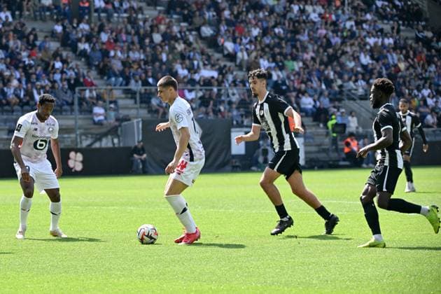 Angers SCO v LOSC Lille - Ligue 1 McDonald s 2024 2025 09 Jonathan Christian DAVID (losc) - 19 Matias Fernandez PARDO (losc) - 12 Zinedine OULD KHALED (sco) during the Ligue 1 McDonald s match between Angers and Lille at Stade Raymond Kopa on April 27, 2025 in Angers, France. Angers France  Copyright: xFEPx 776313174