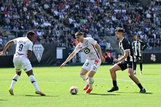 Angers SCO v LOSC Lille - Ligue 1 McDonald s 2024 2025 09 Jonathan Christian DAVID (losc) - 19 Matias Fernandez PARDO (losc) - 12 Zinedine OULD KHALED (sco) during the Ligue 1 McDonald s match between Angers and Lille at Stade Raymond Kopa on April 27, 2025 in Angers, France. Angers France  Copyright: xFEPx 776313174