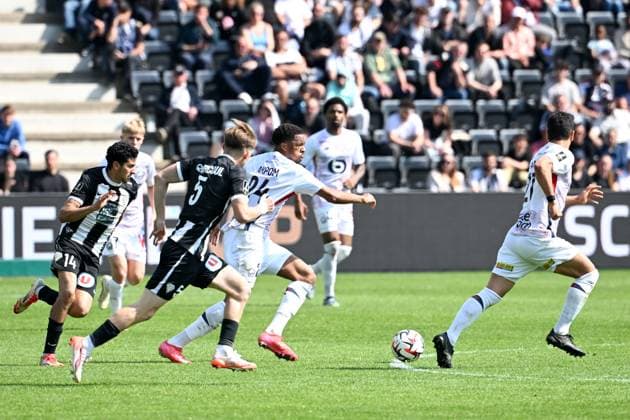 Angers SCO v LOSC Lille - Ligue 1 McDonald s 2024 2025 14 Yassin BELKHDIM (sco) - 24 Chuba AKPOM (losc) during the Ligue 1 McDonald s match between Angers and Lille at Stade Raymond Kopa on April 27, 2025 in Angers, France. Angers France  Copyright: xFEPx 776313174