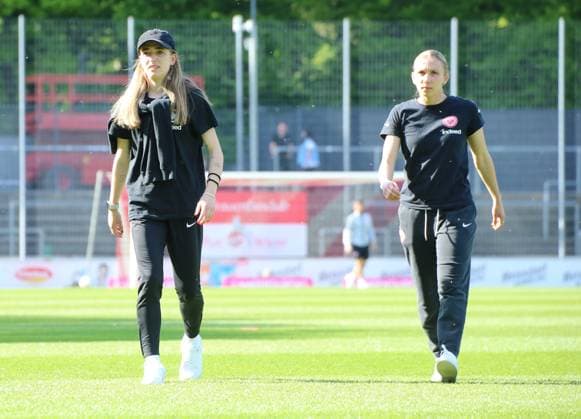 27.04.2025, xgrfx, Fussball Google Pixel Frauen-Bundesliga, 1.FC Köln - Eintracht Frankfurt v.l. Sophia Kleinherne, Elisa Senß (Eintracht Frankfurt) (DFL DFB REGULATIONS PROHIBIT ANY USE OF PHOTOGRAPHS as IMAGE SEQUENCES and or QUASI-VIDEO) Köln