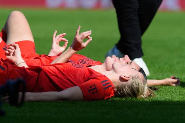 Lea Schueller (11 FC Bayern Munich), Giulia Gwinn (7 FC Bayern Munich) and Jovana Damnjanovic (9 FC Bayern Munich) lay on the pitch after winning the championchip after the Google Pixel Frauen Bundesliga match between FC Bayern Munich and SC Freiburg at FC Bayern Campus, Munich, Germany. (Sven Beyrich SPP) Copyright: xSvenxBeyrich SPPx spp-en-SvBe-20250427-D4S_0412