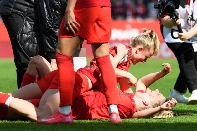 Munich, Germany, Apr 27th 2025: Giulia Gwinn (7 FC Bayern Munich), Jovana Damnjanovic (9 FC Bayern Munich) and Lea Schueller (11 FC Bayern Munich) lay on the pitch after the final whistle after the Google Pixel Frauen Bundesliga match between FC Bayern Munich and SC Freiburg at FC Bayern Campus, Munich, Germany. (Sven Beyrich SPP) Copyright: xSvenxBeyrich SPPx spp-en-SvBe-20250427-ND5_7331