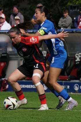 27.04.2025 - Fussball - Saison 2024 2025 - 2. Frauen - Fussball - Bundesliga - 23. Spieltag: 1. FC Nürnberg FCN ( Club Clubfrauen ) - SV Meppen - Sportfoto Zink ChPr - xdcxcpx - 27.04.2025 - Fussball - Saison 2024 2025 - 2. Frauen - Fussball - Bundesliga - 23. Spieltag: 1. FC Nürnberg FCN ( Club Clubfrauen ) - SV Meppen - Sportfoto Zink ChPr - xdcxcpx - Jonna Brengel (17, 1. FC Nürnberg FCN ), Selma Licina (18, SV Meppen )