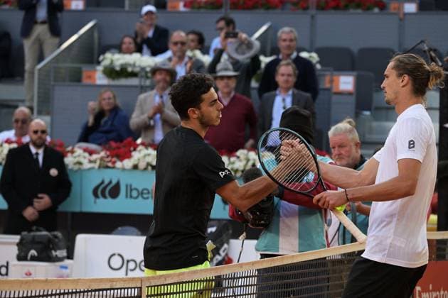 April 29, 2025, Madrid, Madrid, Spian: FRANCISCO CERoÅ¡NDOLO of Argentina celebrate his victory against ALEXANDER ZVERV of Germany during the Men s Singles Round of 16 match on Day Eight of the Mutua Madrid Open at La Caja Magica. Madrid Spian - ZUMAd308 20250429_zsp_d308_042 Copyright: xJuanxCarlosxLucasx