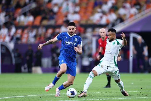 Al-Hilal FC vs Al-Ahli FC - AFC Champions League Elite Semi Finals JEDDAH, SAUDI ARABIA - April 29: Aleksandar Mitrovic of Team Al-Hilal FC competes for the ball with Ali Majrashi of Team AL-Ahli during the AFC Champions League Elite Semi Finals match between Al-Hilal FC and Al-Ahli FC FC at King Abdullah Sports City Stadium on April 29, 2025 in Jeddah, Saudi Arabia. Jeddah Saudi Arabia Copyright: xAbdullahxAhmedx