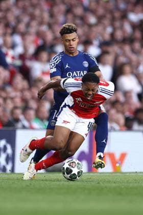 Arsenal v Paris Saint-Germain 29 April 2025, London - UEFA Champions League - Semi Final - First Leg - Arsenal v Paris Saint-Germain - Desire Doue of PSG tackles Myles Lewis-Skelly of Arsenal - Photo: Jacques Feeney Offside. London UK Copyright: xJacquesxFeeneyx xOffsidexOffside