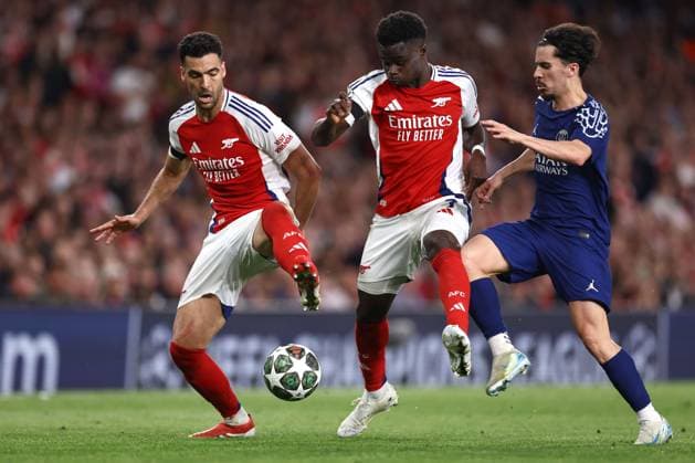 Arsenal v PSG 29 April 2025, London - UEFA Champions League Football - Semi-Final, First Leg - Arsenal v Paris Saint-Germain - Mikel Merino and Bukayo Saka of Arsenal and Vitinha of PSG - Photo: Jacques Feeney Offside. London UK Copyright: xJacquesxFeeneyx xOffsidexOffside
