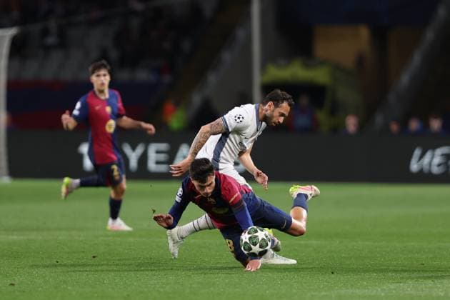 April 30, 2025, Barcelona, Barcelona, Spain: Pedri Gonzalez of FC Barcelona, Barca and Hakan Calhanoglu of FC Internazionale in action during the UEFA Champions League 2024 25 Semi Final First leg, match between FC Barcelona and FC Internazionale Milano at Estadi Olimpic Lluis Companys on April 30, 2025 in Barcelona, Spain. Barcelona Spain - ZUMAa181 20250430_zaa_a181_304 Copyright: xJavierxBorregox