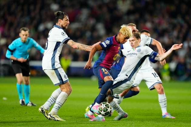 FC Barcelona, Barca v FC Internazionale Milano - UEFA Champions League 2024 25 Semi Final First Leg Lamine Yamal right winger of Barcelona and Spain surrounded by Inter players during the UEFA Champions League 2024 25 Semi Final First Leg match between FC Barcelona and FC Internazionale Milano at Estadi Olimpic Lluis Companys on April 30, 2025 in Barcelona, Spain. Barcelona Madrid Spain  Copyright: xJosexBretonx originalFilename:bretonhernandez-fcbarcel250430_npHC7.jpg