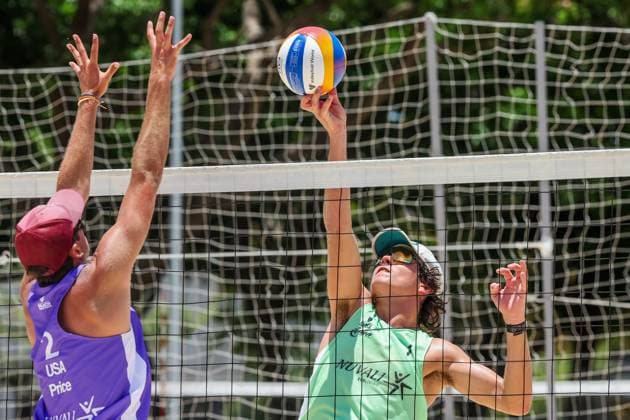 (250501) -- LAGUNA PROVINCE, May 1, 2025 -- Jett Rocker-Graham (Rear) of Australia competes against Cody Price of the United States during the men s qualification match between Jett Rocker-Graham Killian Donovan of Australia and Leigh Sinoto Cody Price of the United States at the Volleyball World Beach Pro Tour Futures in Laguna Province, the Philippines, May 1, 2025. ) (SP)PHILIPPINES-LAGUNA PROVINCE Beach volleyball, Beachvolleyball BEACH PRO TOUR FUTURES ROUELLExUMALI 