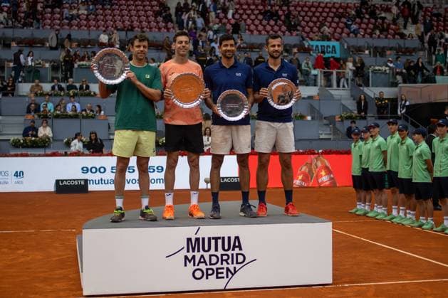 Men s doubles final on Matchday 12 of the Mutua Madrid Open at La Caja Mágica - 03 May 2025 Horacio Zeballos of Argentina and Marcel Granollers of Spain pose for a photo with their Mutua Madrid Open Men s Doubles Final winners trophies, as Marcelo Arevalo of El Salvador and Mate Pavic of Croatia pose with their runners-up trophies on Day 12 of the Mutua Madrid Open at La Caja Magica. Final score: 6-4, 6-4 for Granollers and Zeballos Madrid Spain Copyright: xDavidxCanalesx xSOPAxImagesx DCFinaldoblesMascOpenMadrid1MAYO-57