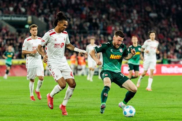 2. Fußball Bundesliga: 1. FC Köln - SSV Jahn Regensburg; 03.05.2025 Zweikampf Damion Downs (1. FC Köln, 42), Christian Kühlwetter (SSV Jahn Regensburg, 30) 2. Fußball Bundesliga, 1. FC Köln - SSV Jahn Regensburg, Köln, Rheinenergiestadion am 03.05.2025 DFL REGULATIONS PROHIBIT ANY USE OF PHOTOGRAPHS AS IMAGE SEQUENCES AND OR QUASI-VIDEO.