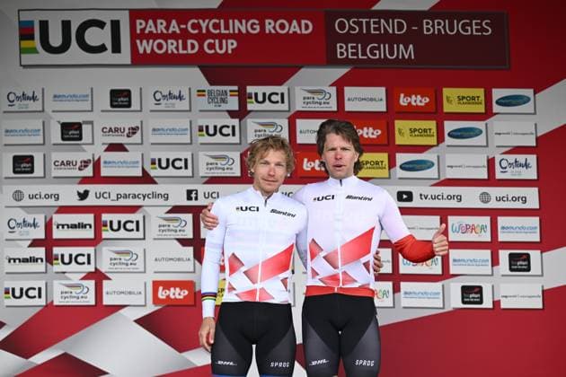 Netherlands MB para-cycling athlete Tristan Bangma and pilote Brian Megens and pictured on the podium as World Cup leaders after the road races at the UCI Para-Cycling Road World Cup event, Sunday 04 May 2025, in Brugge. The UCI Para-Cycling Road World Cup takes place from 01 to 04 May in Oostende and Brugge. LUCxCLAESSEN  x122645956x