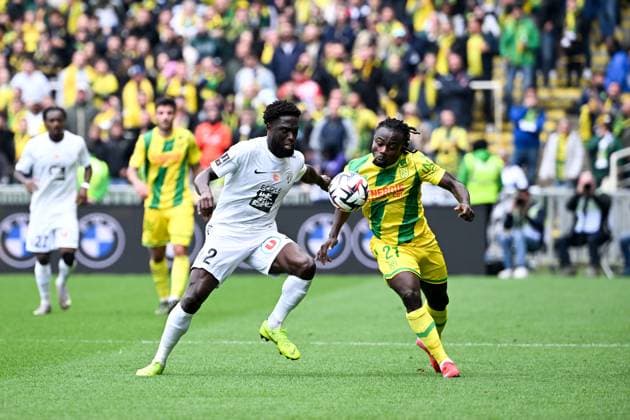 FC Nantes v Angers SCO - Ligue 1 MCDonald s 2024 2025 27 Moses SIMON (fcn) - 02 Carlens ARCUS (sco) during the Ligue 1 MCDonald s match between Nantes and Angers at Beaujoire Stadium on May 4, 2025 in Nantes, France. Nantes France  Copyright: xFEPx 776316596