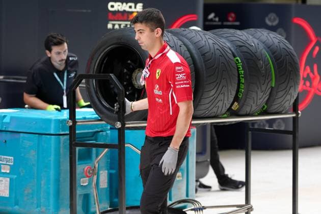 A member of Team Ferrari works with tires  Copyright: xScottxColeman IPAxSportx xipa-agency.netx xx IPA_57251403 IPA_Agency_IPA57251403
