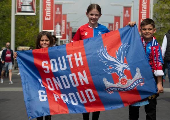 Crystal Palace v Aston Villa - Emirates FA Cup Semi Final LONDON, ENGLAND - APRIL 26: Crystal Palace fans with a Crystal Palace flag are seen on Wembley Way prior to the Emirates FA Cup Semi Final match between Crystal Palace and Aston Villa at Wembley Stadium on April 26, 2025 in London, England. London Wembley Stadium England United Kingdom Copyright: xVisionhausx 776310299