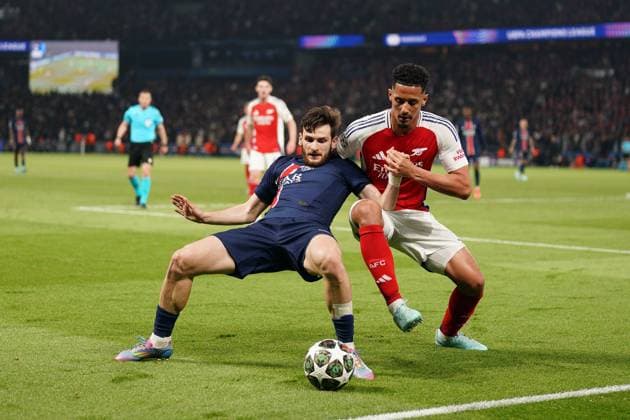 Khvicha Kvaratskhelia of PSG and William Saliba of Arsenal Paris Saint-Germain v Arsenal, UEFA Champions League, Semi Final, Second Leg, Football, Parc des Princes, Paris, France - 07 May 2025 EDITORIAL USE ONLY No use with unauthorised audio, video, data, fixture lists, club league logos or live services. Online in-match use limited to 120 images, no video emulation. No use in betting, games or single club league player publications.  Copyright: xDavexWinter Shutterstockx 15288067cz
