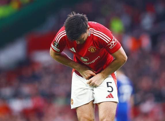 Harry Maguire of Manchester United, ManU feels the pain from a knock Manchester United v Athletic Bilbao, UEFA Europa League, Semi Final, Second Leg, Football, Old Trafford, Manchester, UK - 08 May 2025 EDITORIAL USE ONLY No use with unauthorised audio, video, data, fixture lists, club league logos or live services. Online in-match use limited to 120 images, no video emulation. No use in betting, games or single club league player publications. Copyright: xMattxWest Shutterstockx 15288260z