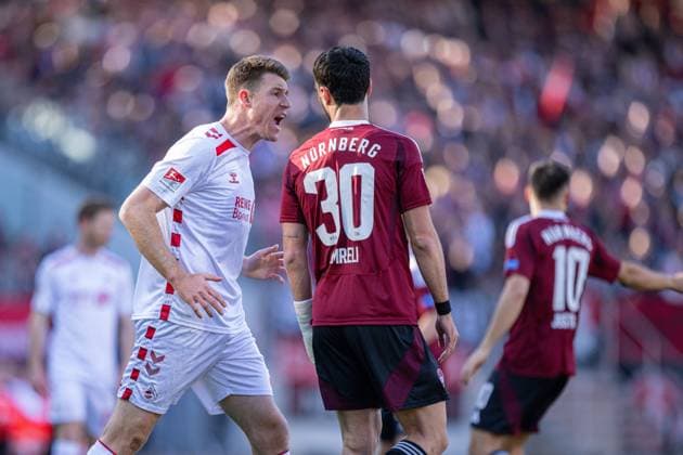 09.05.2025, Fussball, 2. Bundesliga, 33. Spieltag Saison 2024 2025, 1.FC Nürnberg - 1.FC Köln, Dominique Heintz (1. FC Köln) (l) schreit Mahir Emreli (1. FC Nürnberg) an. xRHR-FOTO TKx