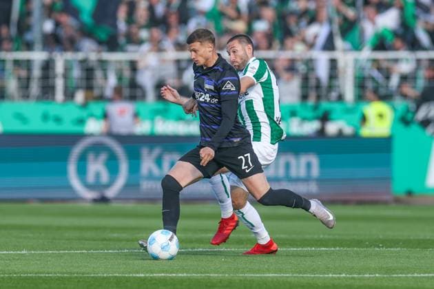 09.05.2025, Fussball, Saison 2024 2025, 2. Bundesliga, 33. Spieltag, Preussen Münster - Hertha BSC, v. l. Michael Cuisance (Hertha BSC), Rico Preißinger (Preußen Münster) Münster LVM Arena NRW Deutschland xRHR-FOTO TRx