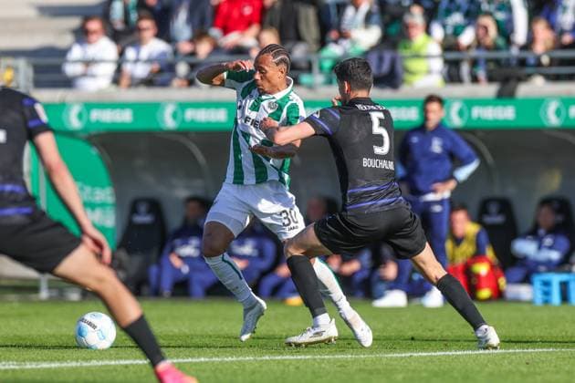 09.05.2025, Fussball, Saison 2024 2025, 2. Bundesliga, 33. Spieltag, Preussen Münster - Hertha BSC, v. l. Etienne Amenyido (Preußen Münster), Andreas Bouchalakis (Hertha BSC) Münster LVM Arena NRW Deutschland xRHR-FOTO TRx