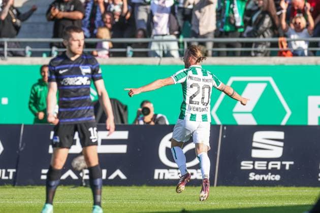 09.05.2025, Fussball, Saison 2024 2025, 2. Bundesliga, 33. Spieltag, Preussen Münster - Hertha BSC, Jorrit Hendrix (Preußen Münster) jubelt nach dem Tor zum 1 zu 0. Münster LVM Arena NRW Deutschland xRHR-FOTO TRx
