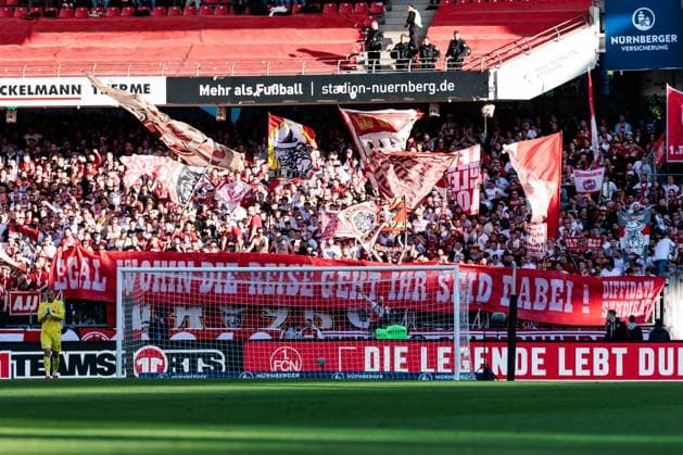 1. Fußball Bundesliga: 1. FC Nürnberg - 1. FC Köln; 09.05.2025 Banner in der Gastkurve Egal wohin die Reise geht, ihr seid dabei! 1. Fußball Bundesliga, 1. FC Nürnberg - 1. FC Köln, Nürnberg, Max-Morlock-Stadion am 09.05.2025 DFL REGULATIONS PROHIBIT ANY USE OF PHOTOGRAPHS AS IMAGE SEQUENCES AND OR QUASI-VIDEO.